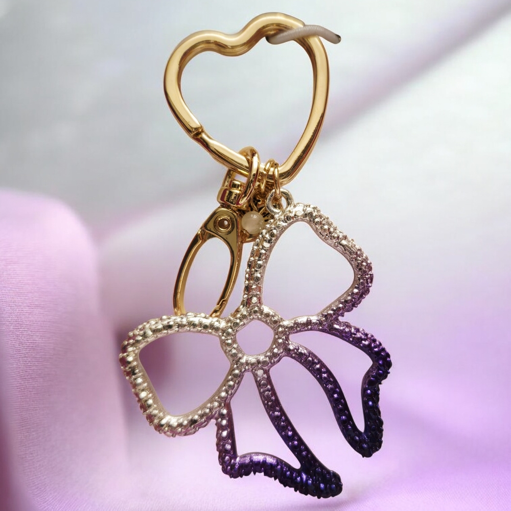 NEW BETSEY JOHNSON Metallic Silver Purple Ribbon Bag Charm  Keychain Gift Boxed